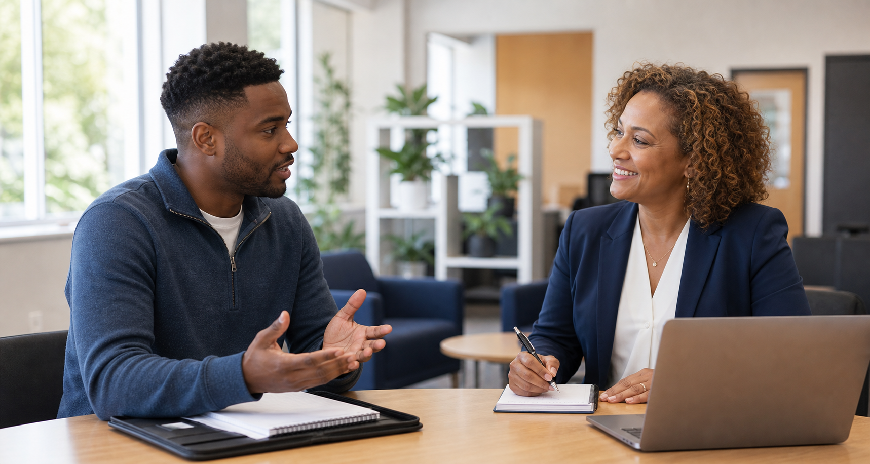 Employment coach practicing interview preparation with a customer